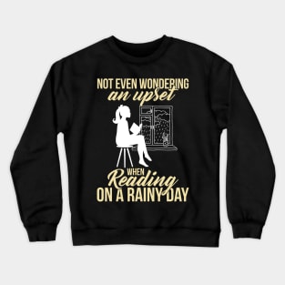 Reading on a rainy day Crewneck Sweatshirt